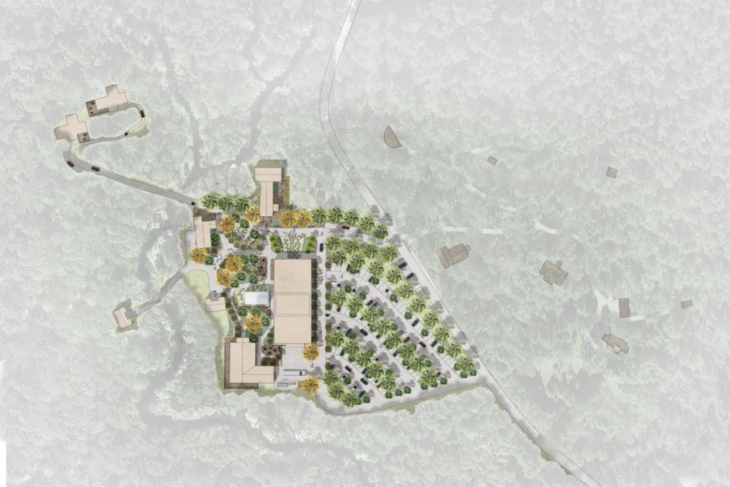 Aerial master plan showing residential buildings, parking, landscaping, and forest integration with site design.